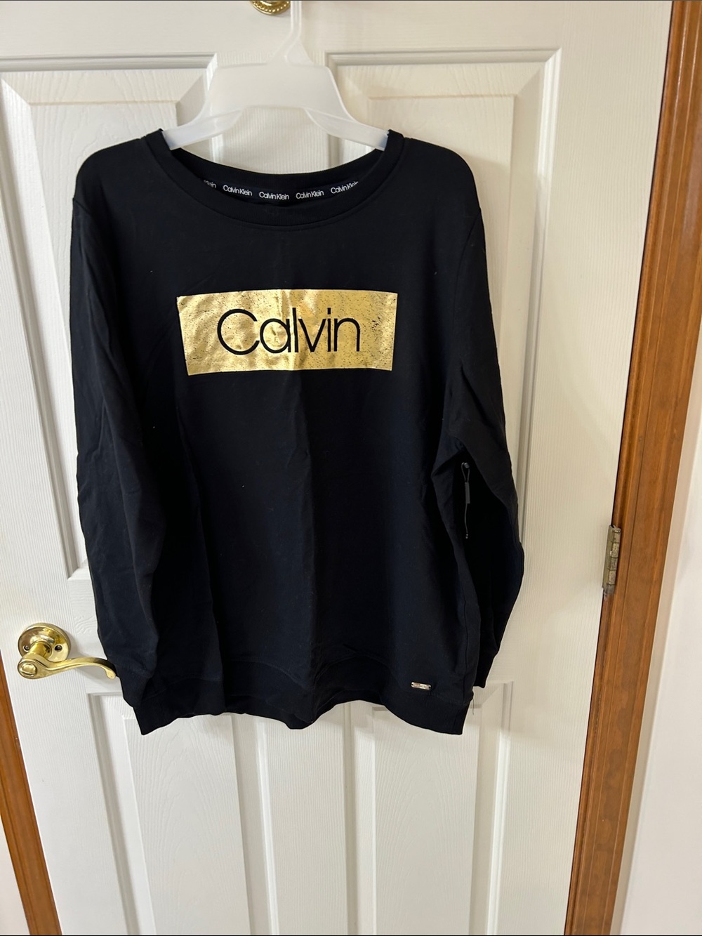 Calvin Klein Black Long-Sleeve Tee with Gold Logo